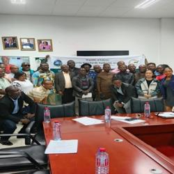 Participants pose for photo