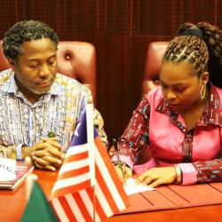 Assistant Minister Charlyne A. Taylor with Dr. Ibrahim Nyei